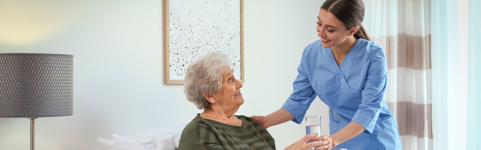 nurse assisting senior